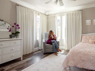 White drapery, bedroom, metal rods, light filtering, blackout