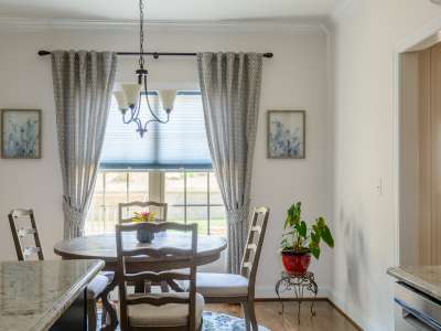 Custom Draperies Paired with Cellular Shades for Dining Area